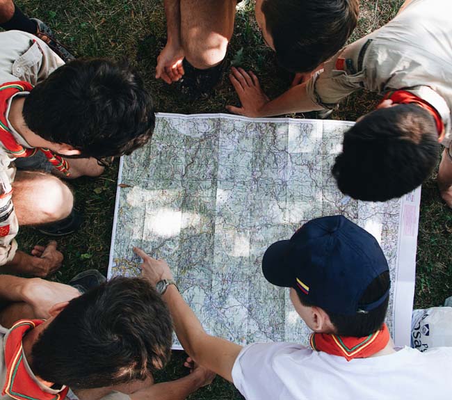 Scouts looking at map