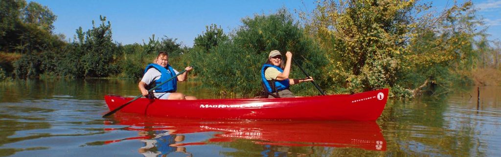 A couple of visitors on a canoe